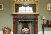 Regency styled wood framed gilt wood overmantel mirror