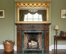 Regency styled wood framed gilt wood overmantel mirror