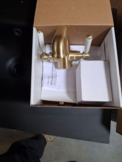 Brushed brass tap