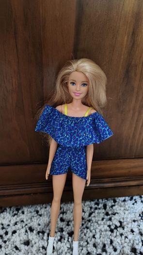 Barbie with car.