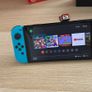 Nintendo Switch OLED (Neon Blue/Red) + Mario Kart 8 Deluxe + Super Mario Bros. W Image 3