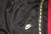 Nike men tracksuit bottoms size L brand new