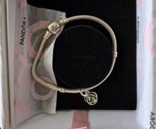 Brand new Pandora Moments Snake Chain Bracelet with green stone charm