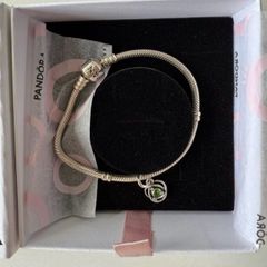 Brand new Pandora Moments Snake Chain Bracelet with green stone charm