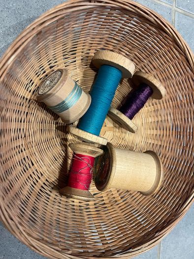 Vintage spools of thread and basket