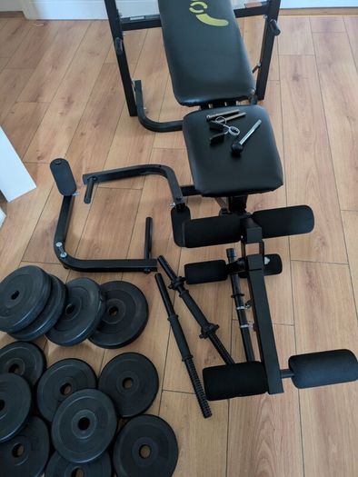 weight bench with weights and bars