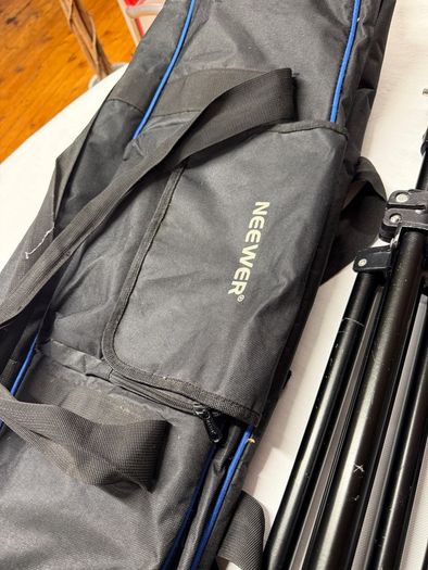 4 tripods with lighting mounts