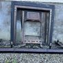 Wooden fireplace surround with carved details Image 4