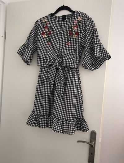 Gingham dress with floral embroidery detail