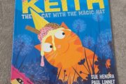 Keith the cat with the magic hat