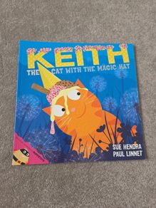 Keith the cat with the magic hat