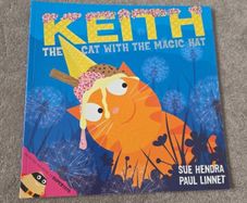 Keith the cat with the magic hat