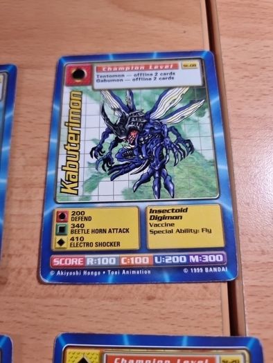 13 Champion level Digimon cards. 1999.
