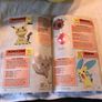Pokemon items plush large Pikachu, Pokemon headphones and deluxe essential handbook Image 9