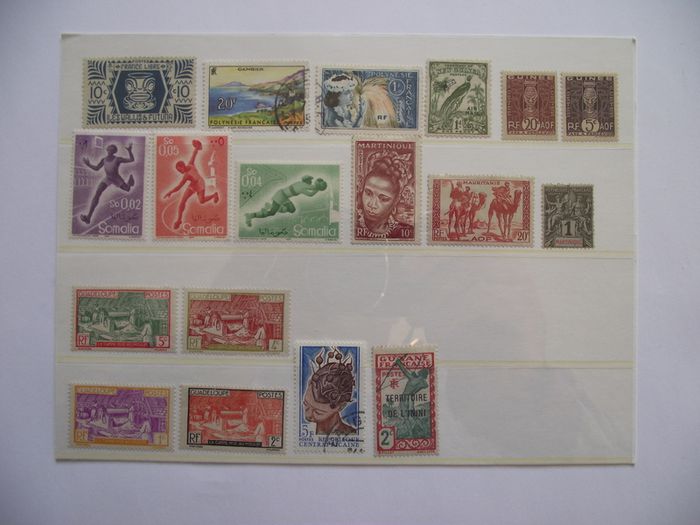 The collection of old stamps from French colonies on stock cards