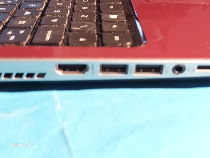 HP Pavillion, Red, 4GB Ram, 700GB HDD, Windows 8 Pro, AMD A4-5000 APU with Radeon HD Graphis 1.5GHz, Chrome and VLC for best movie ecperience