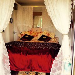 Four posted double bed
