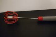 Spring loaded whisk