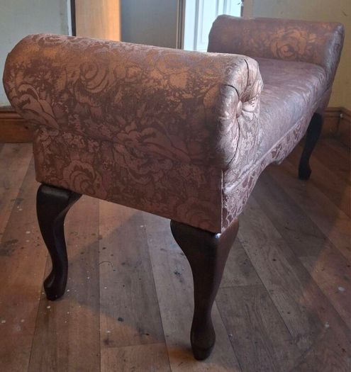 very old small type sofa