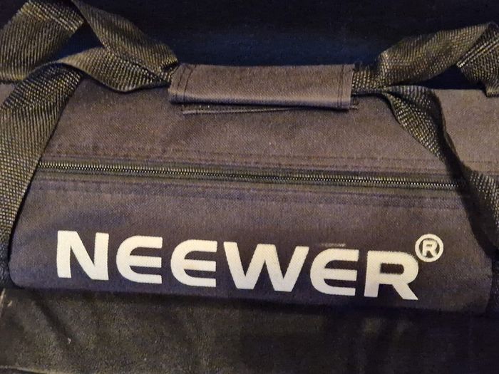 NEEWER, 2 Photography Tripods and feet and also 5ft circular Silver Light enhancer all in new condition and in lovely cases