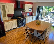 Cream Kitchen with Solid Oak Worktops + integrated Dishwasher & Fridge/Freezer + new Quartz black Sink & Mixer Tap