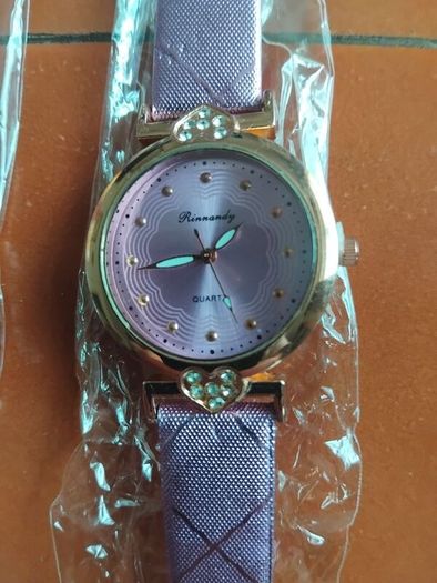 2 womans watches with leather straps