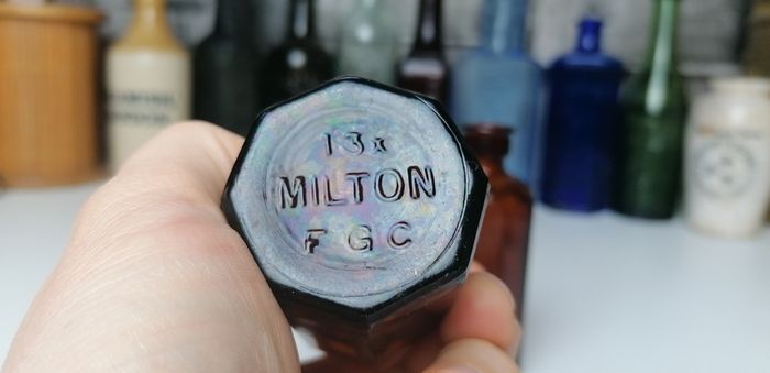 83 - Two Vintage Milton Brown Glass Bottles Bottom Embossed Letters