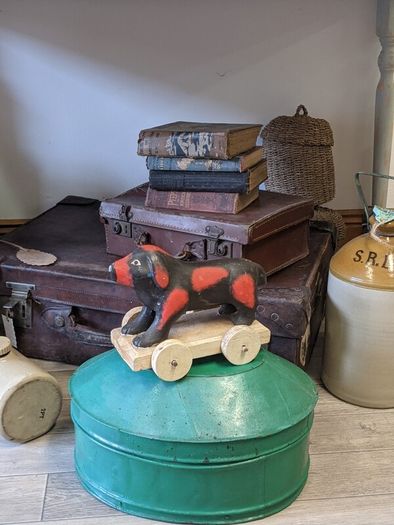 vintage wooden dog on wheels