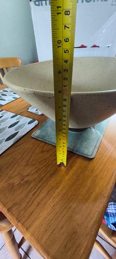 Large Angular Beige speckled ceramic bowl with a wide conical flare and a dark brawn contrasting base By Paul Costelloe.