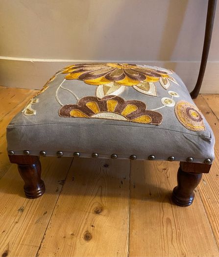 Decorative Grey upholstered footstool mustard embroidery wooden legs