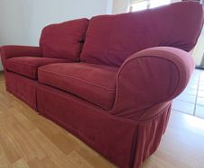 Double seat (seats two) dark red burgundy fabric couch