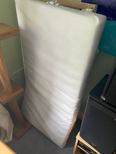 White wooden cot