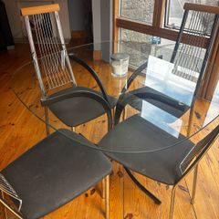 Bargain glass round table and chairs vgc