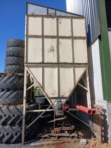 large hopper bin with built in augher