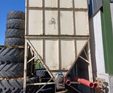 large hopper bin with built in augher