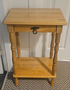 Wooden side table with drawer