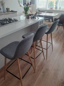 Kitchen counter stools x3, grey fabric. 1 stool wonky but still fine to sit on