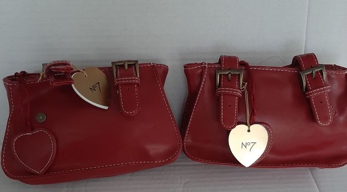 New leather make up bag tag attached