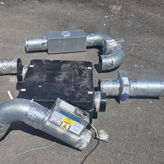 vent axia ventilation system with heating coil