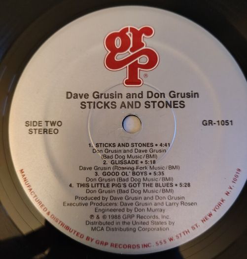 Dave Grusin, Don Grusin - Sticks And Stones Vinyl LP (1988) US 1st Pressing Jazz Fusion EX+