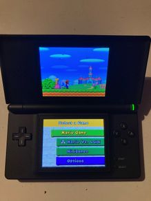 NINTENDO DS LITE ( mint condition) including 3 games