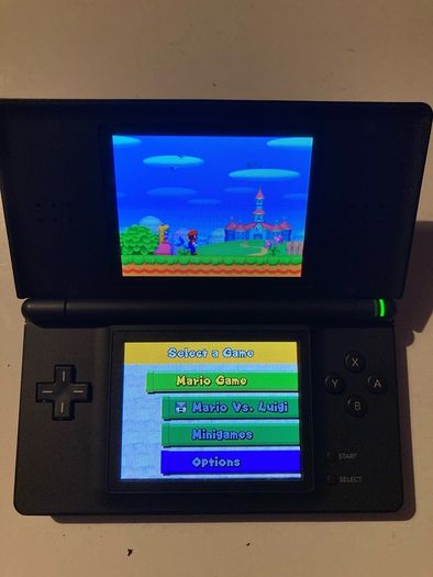 NINTENDO DS LITE ( mint condition) including 3 games