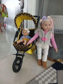 dolls and  buggy