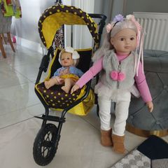 dolls and  buggy