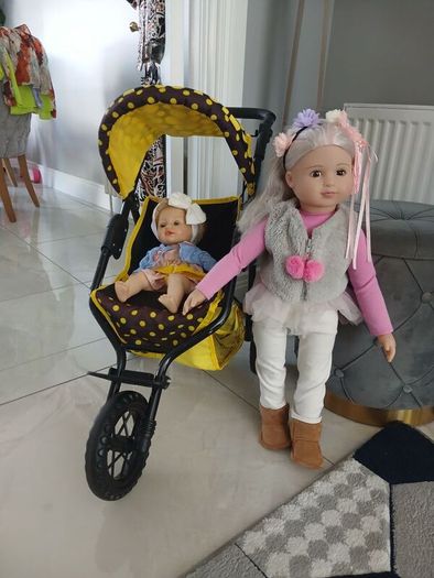 dolls and  buggy