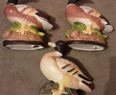 three duck figurines