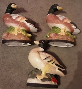 three duck figurines