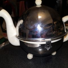 Antique insulated teapot England