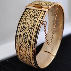 Vintage Damascene hinged bracelet  with a safety chain