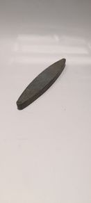 A Canoe Shaped Medium Grit Sharpening Stone